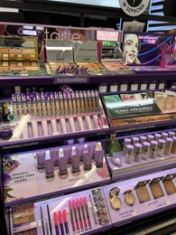 Photo of WARSAW, POLAND - JULY 17, 2022: Cosmetic products on display in Tarte retail store