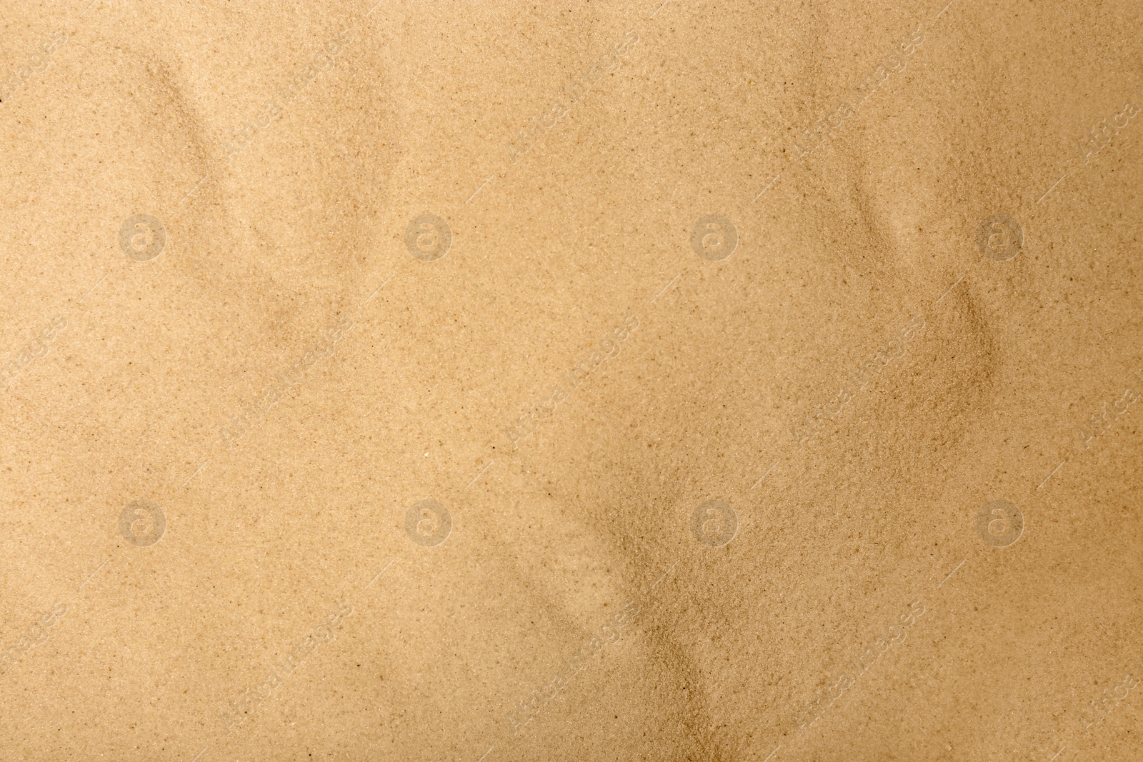 Photo of Dry beach sand as background, top view