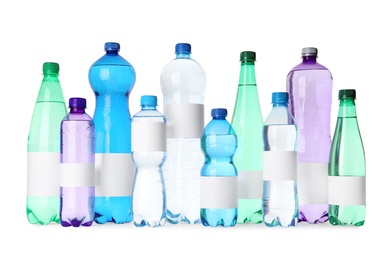 Bottles of pure water with blank labels on white background