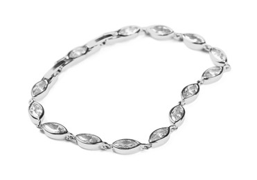 Photo of Elegant silver bracelet with gemstones isolated on white. Luxury jewelry