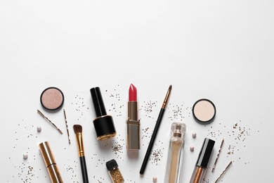 Photo of Different luxury makeup products on white background, top view