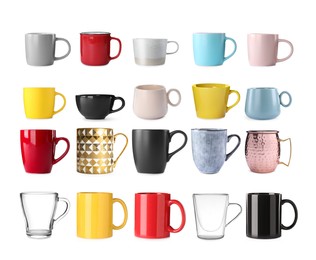 Set with different beautiful cups on white background