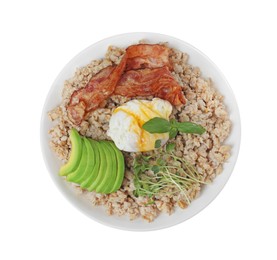 Photo of Delicious boiled oatmeal with poached egg, bacon and avocado in bowl isolated on white, top view