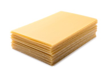 Photo of Stack of uncooked lasagna sheets isolated on white