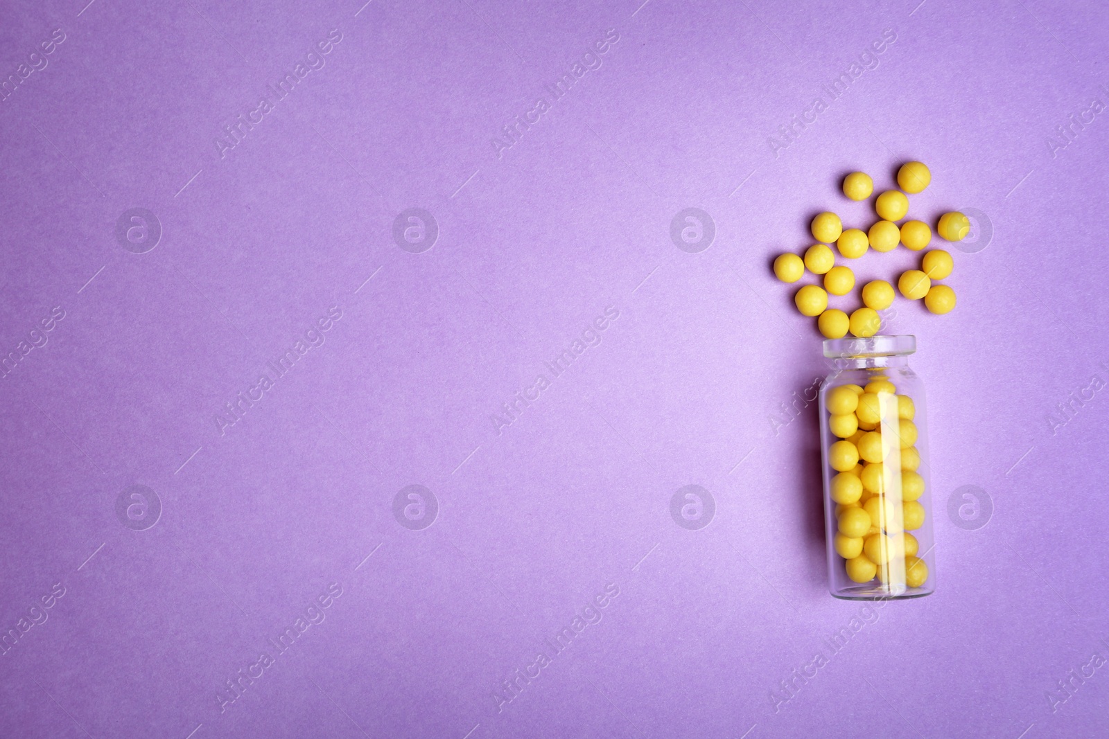 Photo of Flat lay composition with pills and space for text on color background. Medical treatment