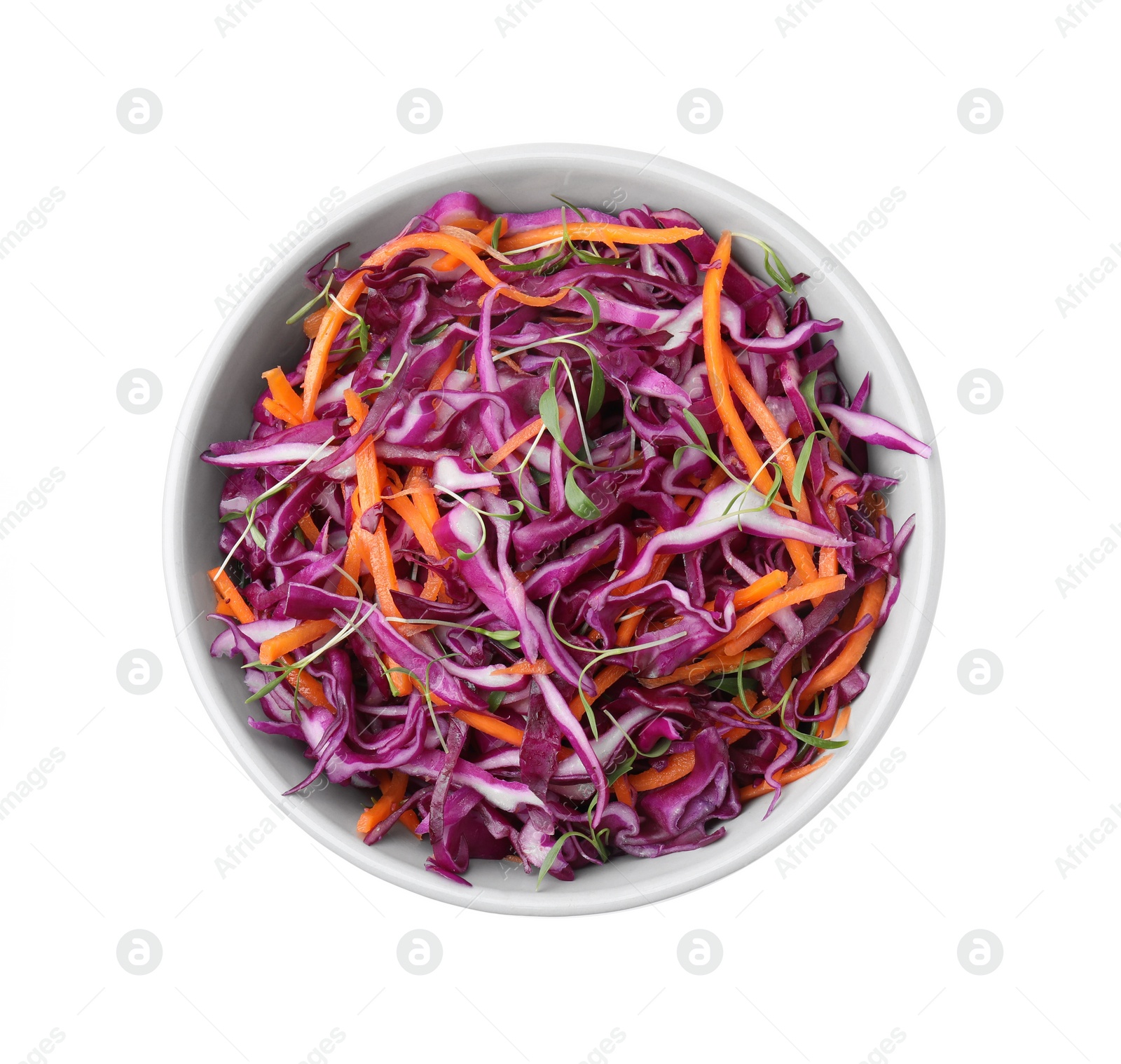 Photo of Tasty salad with red cabbage in bowl isolated on white, top view