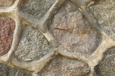 Photo of Texture of grey stone surface as background