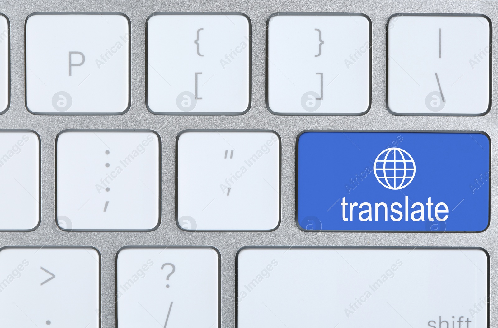 Image of Blue button with word TRANSLATE on computer keyboard, top view