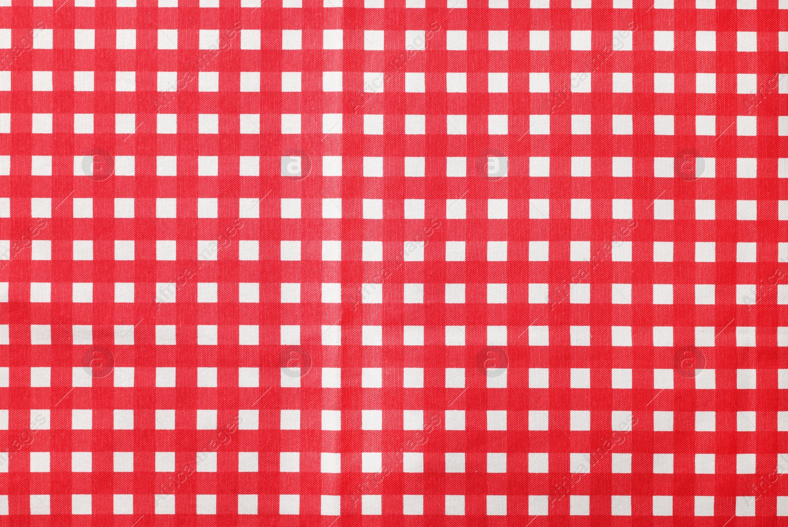 Photo of Red checkered tablecloth as background, top view