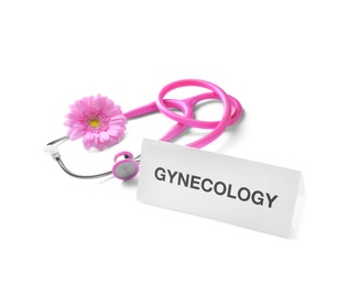 Photo of Card with word Gynecology, flower and stethoscope on white background