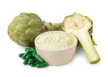 Photo of Fresh artichokes, pills and powder isolated on white