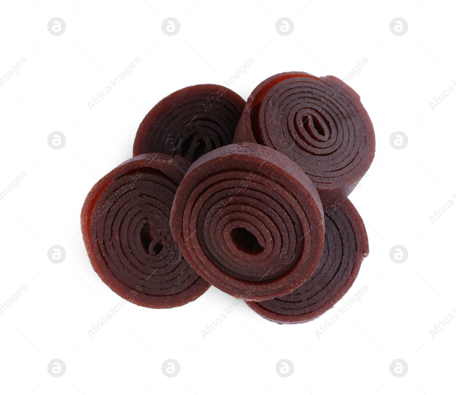 Photo of Delicious fruit leather rolls on white background, top view