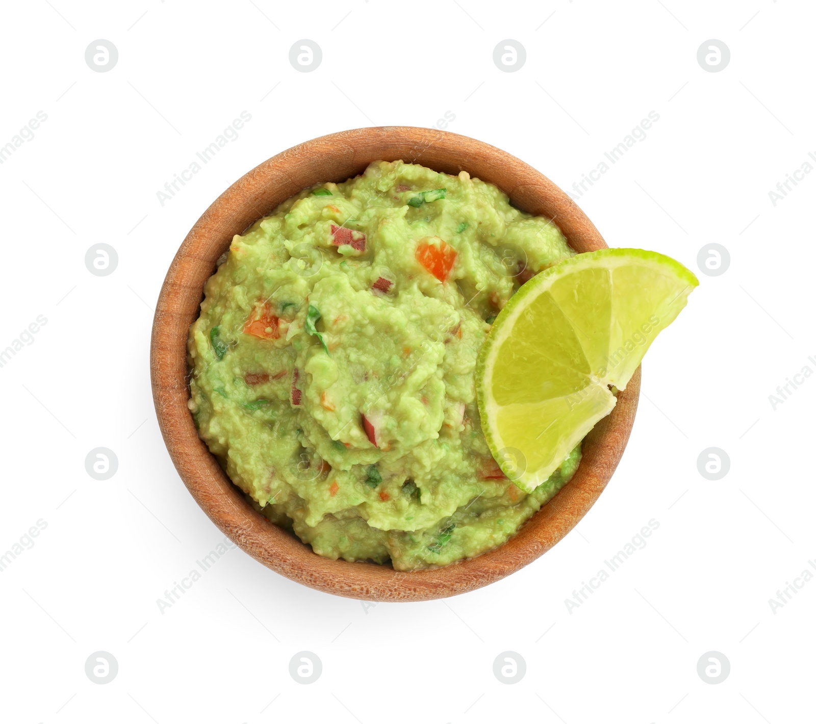 Photo of Bowl of delicious guacamole with lime isolated on white, top view