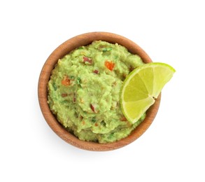 Bowl of delicious guacamole with lime isolated on white, top view