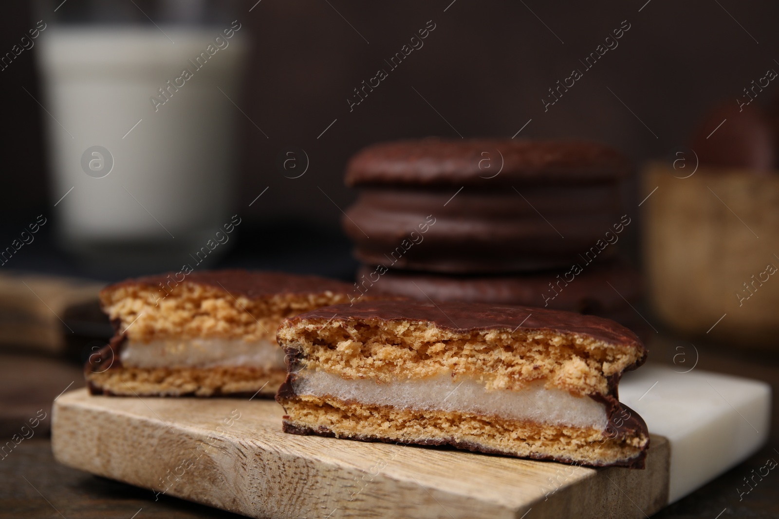 Photo of Tasty choco pies on table, closeup. Space for text