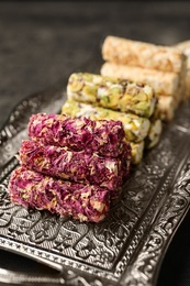 Photo of Turkish delight dessert on tray. Traditional sweet