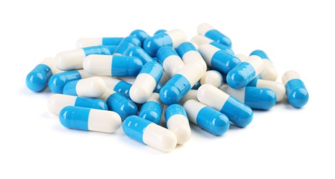 Photo of Pile of antibiotic pills isolated on white