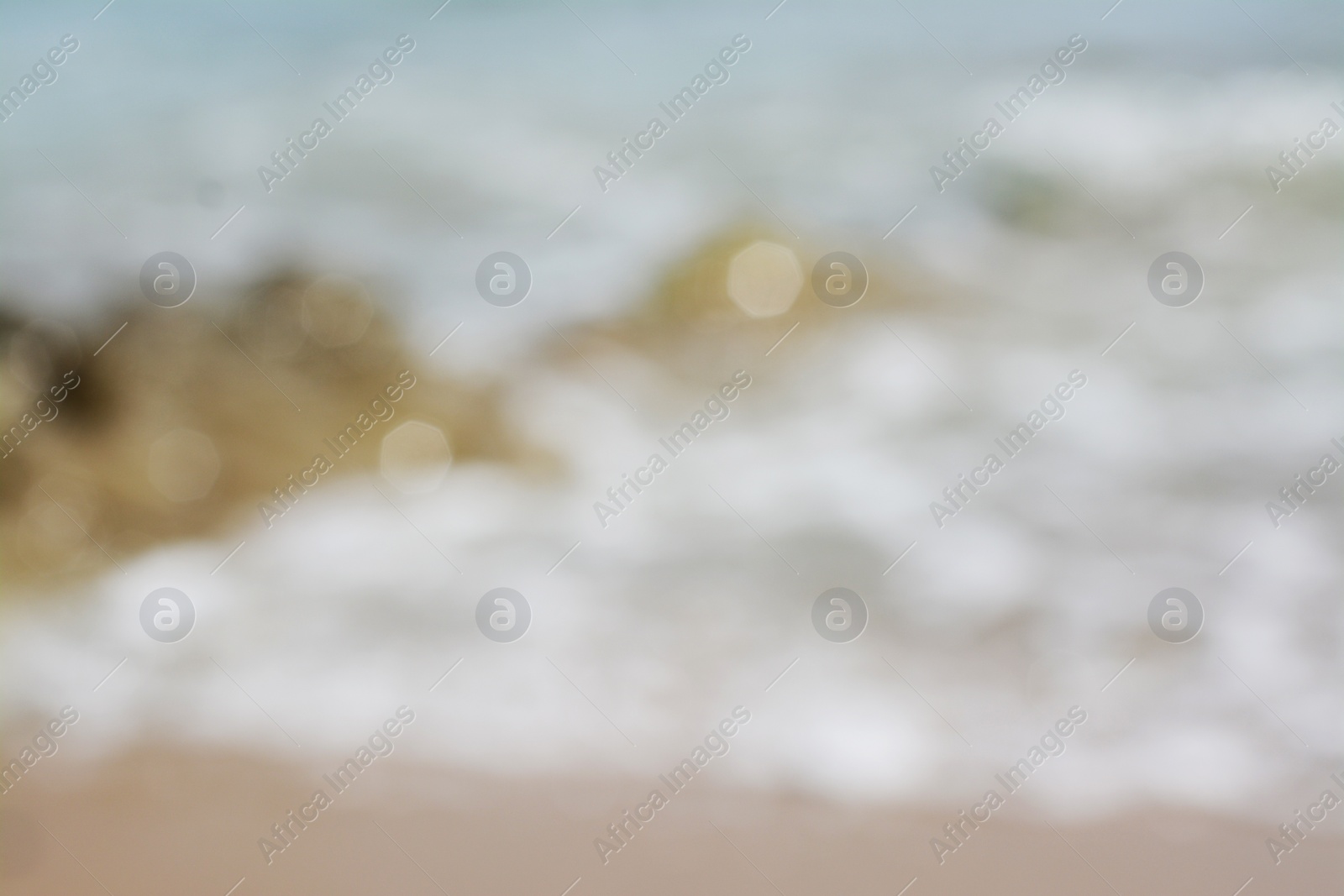 Photo of Blurred view of seaside, bokeh effect. Summer vacation