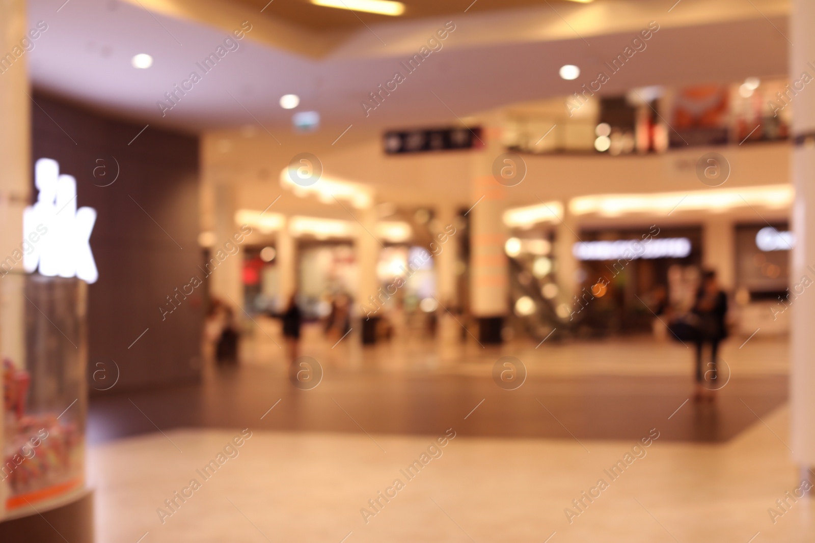 Photo of Blurred view of big modern shopping mall