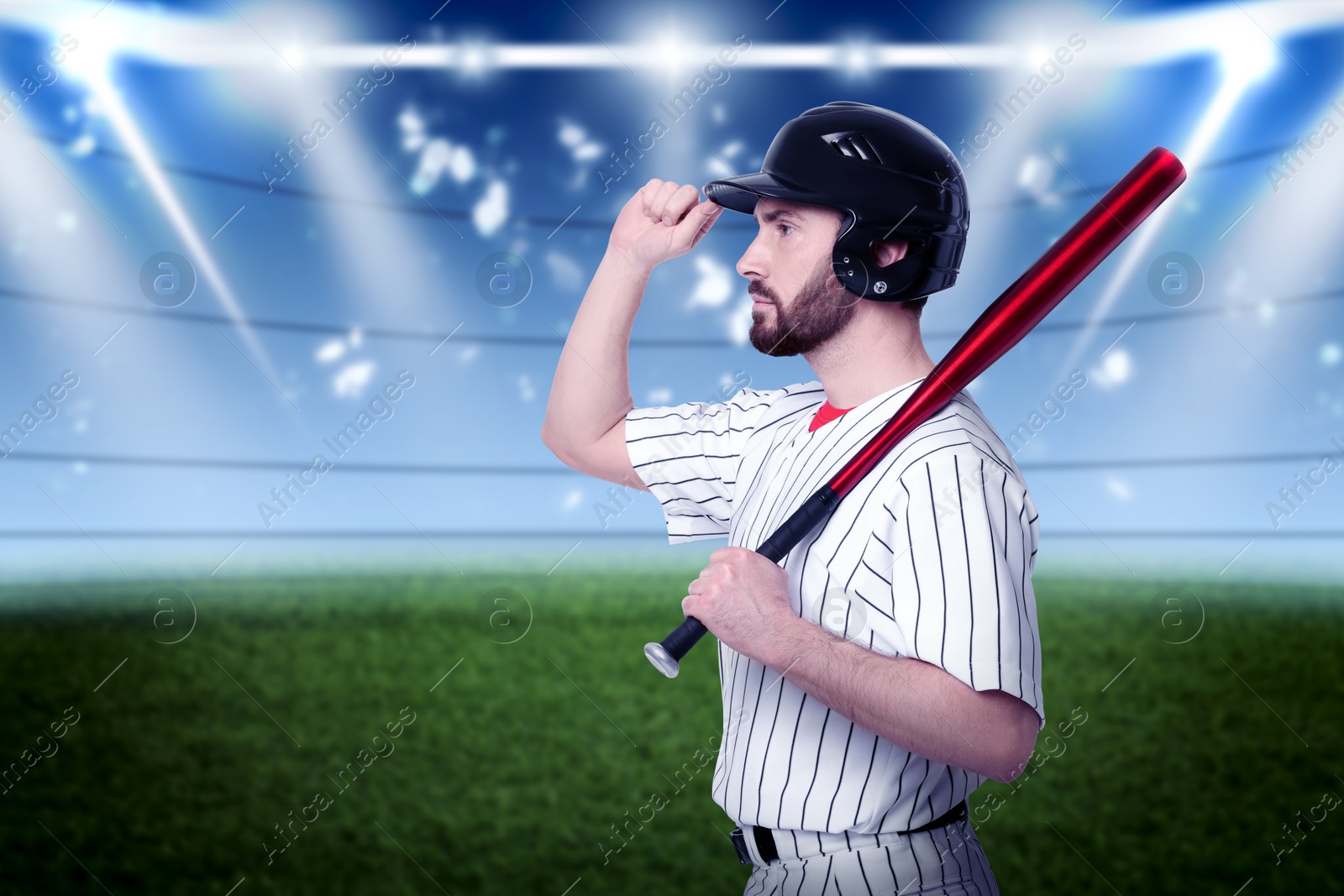 Image of Professional baseball player with bat on stadium