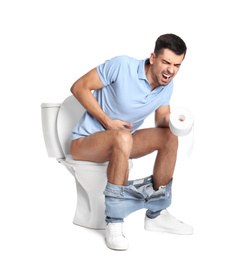 Photo of Man suffering from diarrhea on toilet bowl, white background