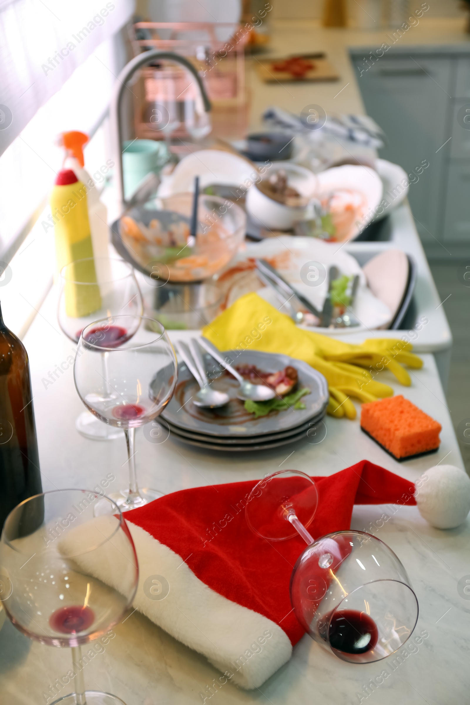 Photo of Dirty dishes in kitchen after new year party