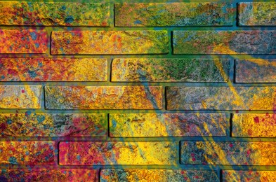 Image of Abstract colorful graffiti drawn on brick wall