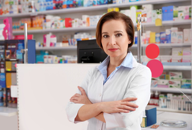 Image of Portrait of professional pharmacist in modern drugstore