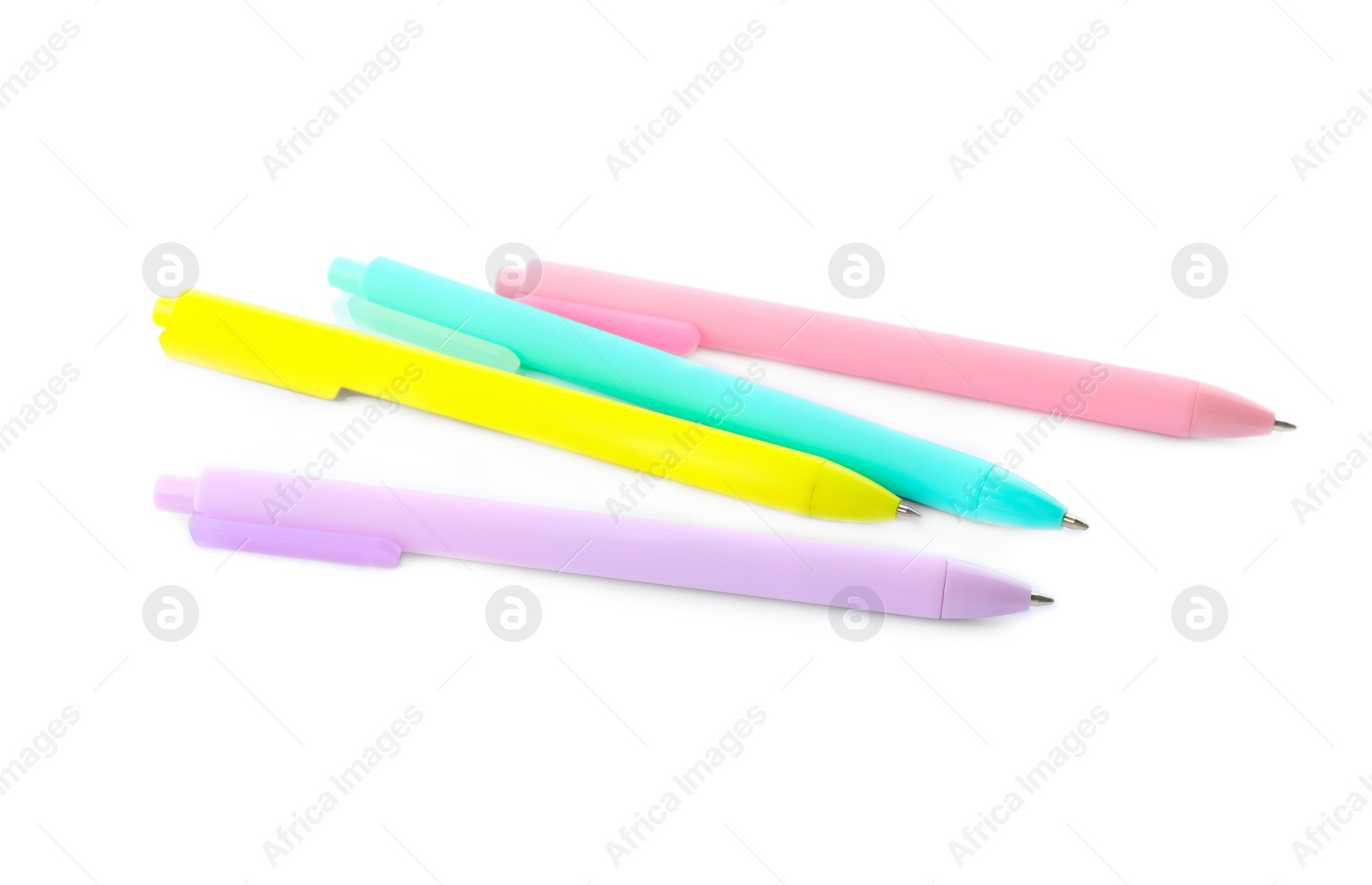 Photo of Set of colorful retractable pens isolated on white