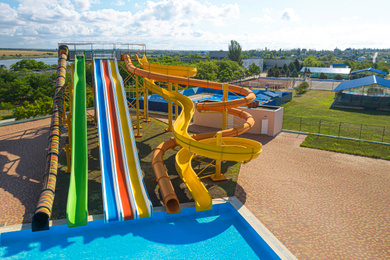 Image of Aerial view of water park on sunny day