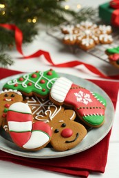 Photo of Tasty homemade Christmas cookies on white table