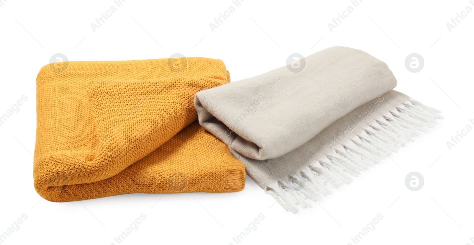 Photo of Two soft warm blankets isolated on white