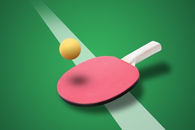 Image of Paddle and ball on green ping pong table