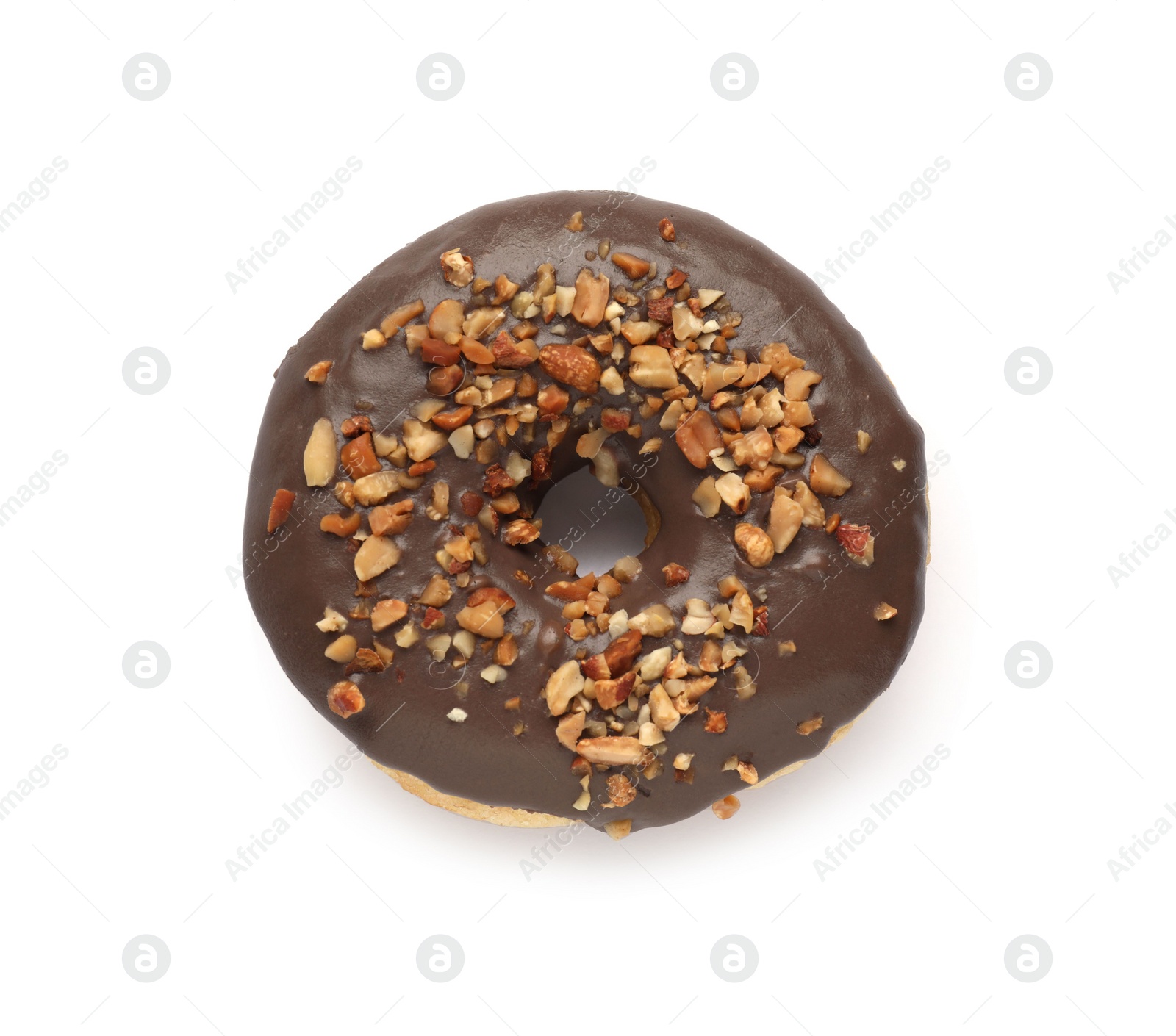 Photo of Tasty glazed donut decorated with nuts isolated on white, top view
