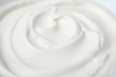 Photo of Delicious natural yogurt as background, closeup view