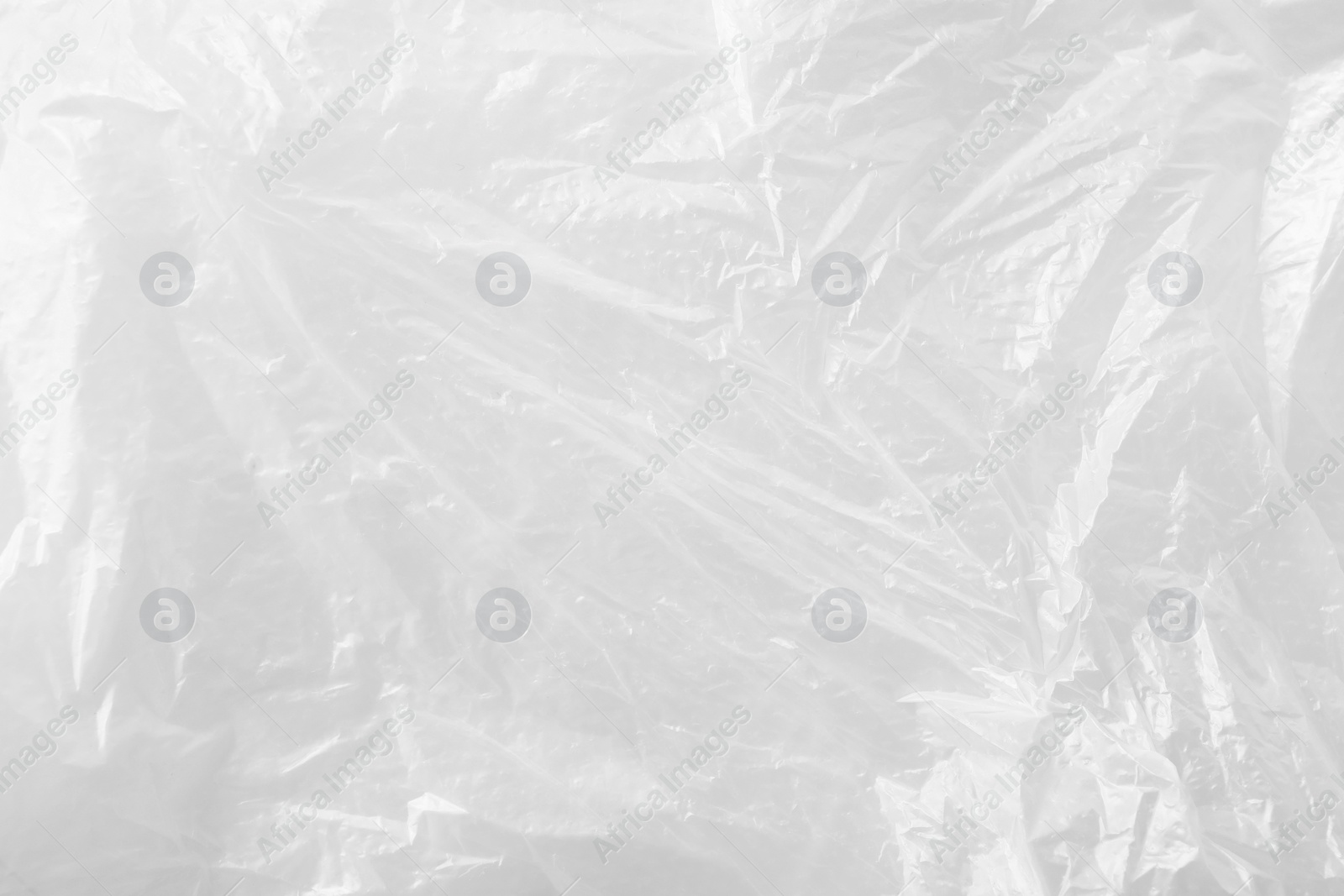 Photo of Texture of white plastic bag as background, closeup