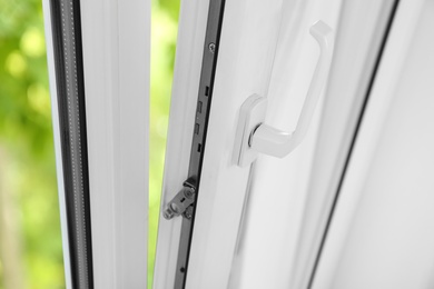 Photo of Modern window indoors, closeup view. Home interior