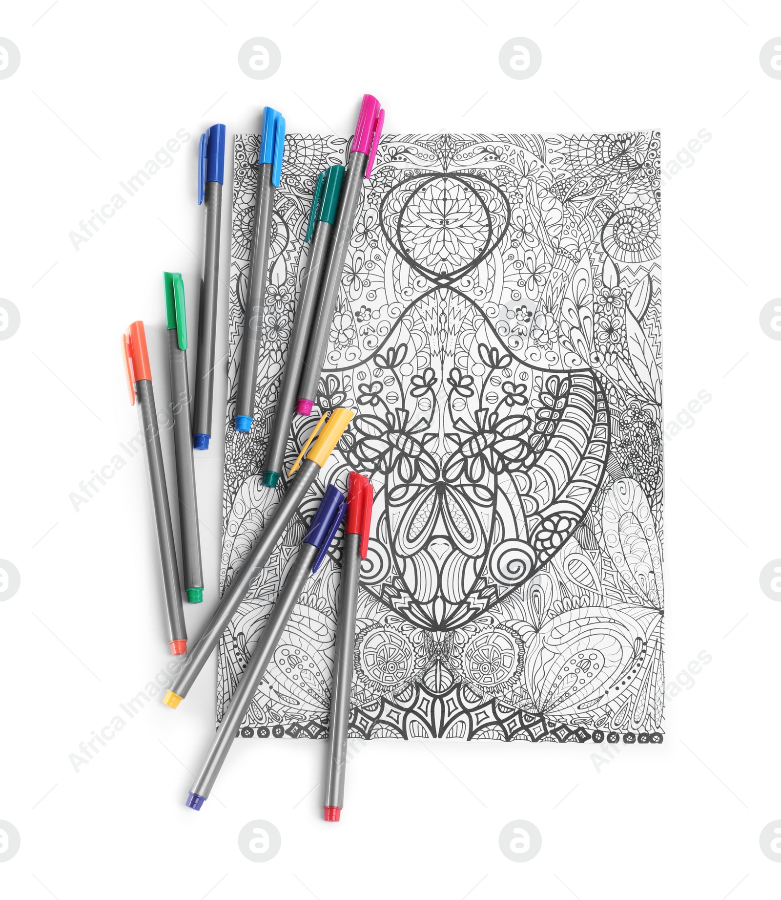 Photo of Antistress coloring page and felt tip pens on white background, top view