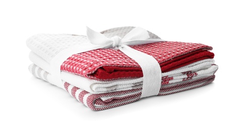 Photo of Stack of clean kitchen towels isolated on white