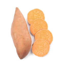 Whole and cut ripe sweet potatoes on white background, top view