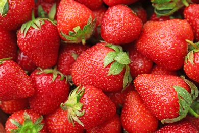 Many ripe red strawberries as background, closeup