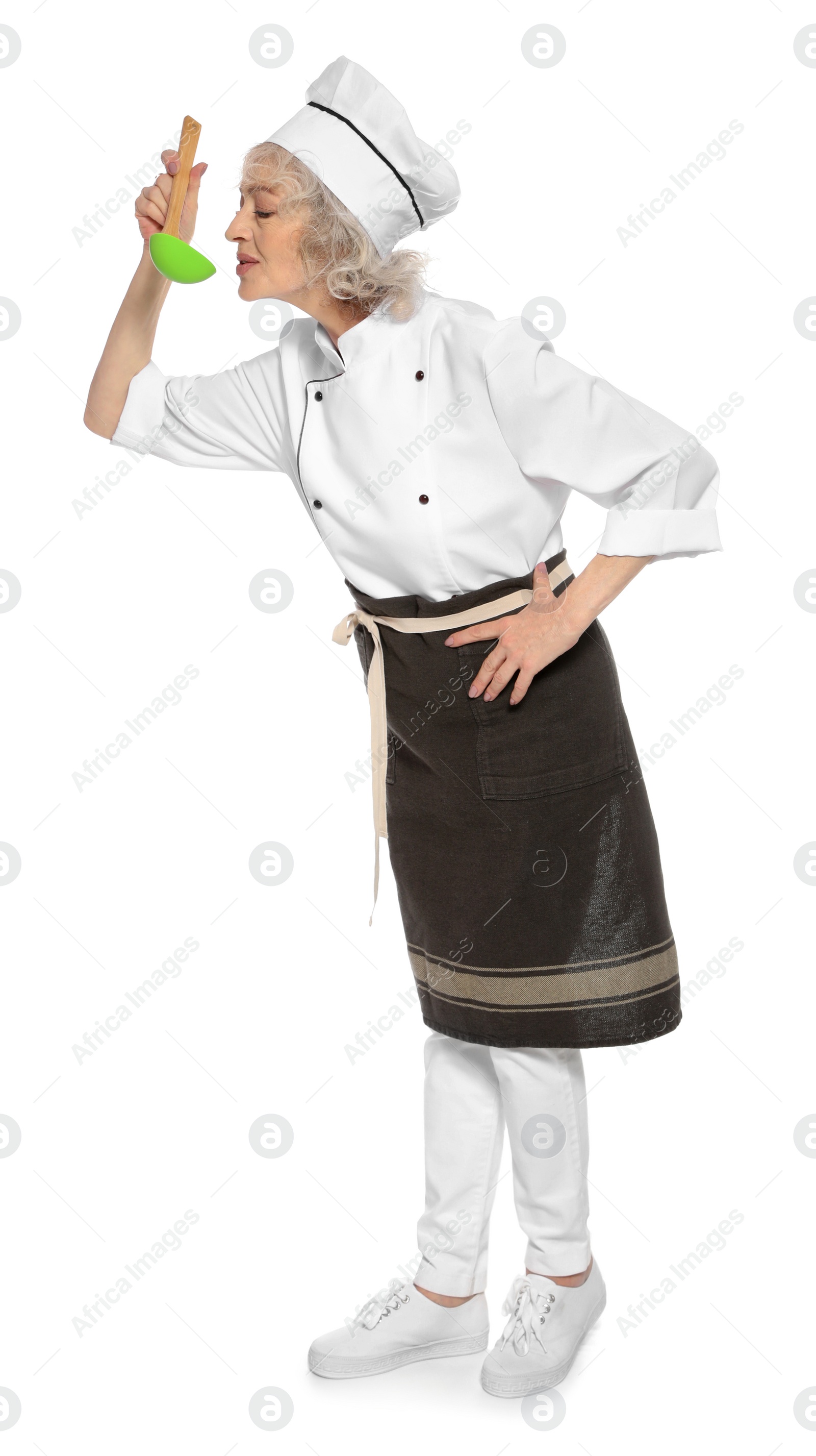 Photo of Professional chef with ladle on white background