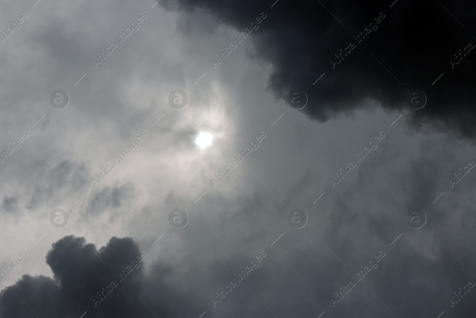 Photo of Sky with heavy rainy clouds on grey day