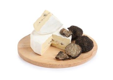 Photo of Wooden board with delicious cheese and fresh black truffles isolated on white