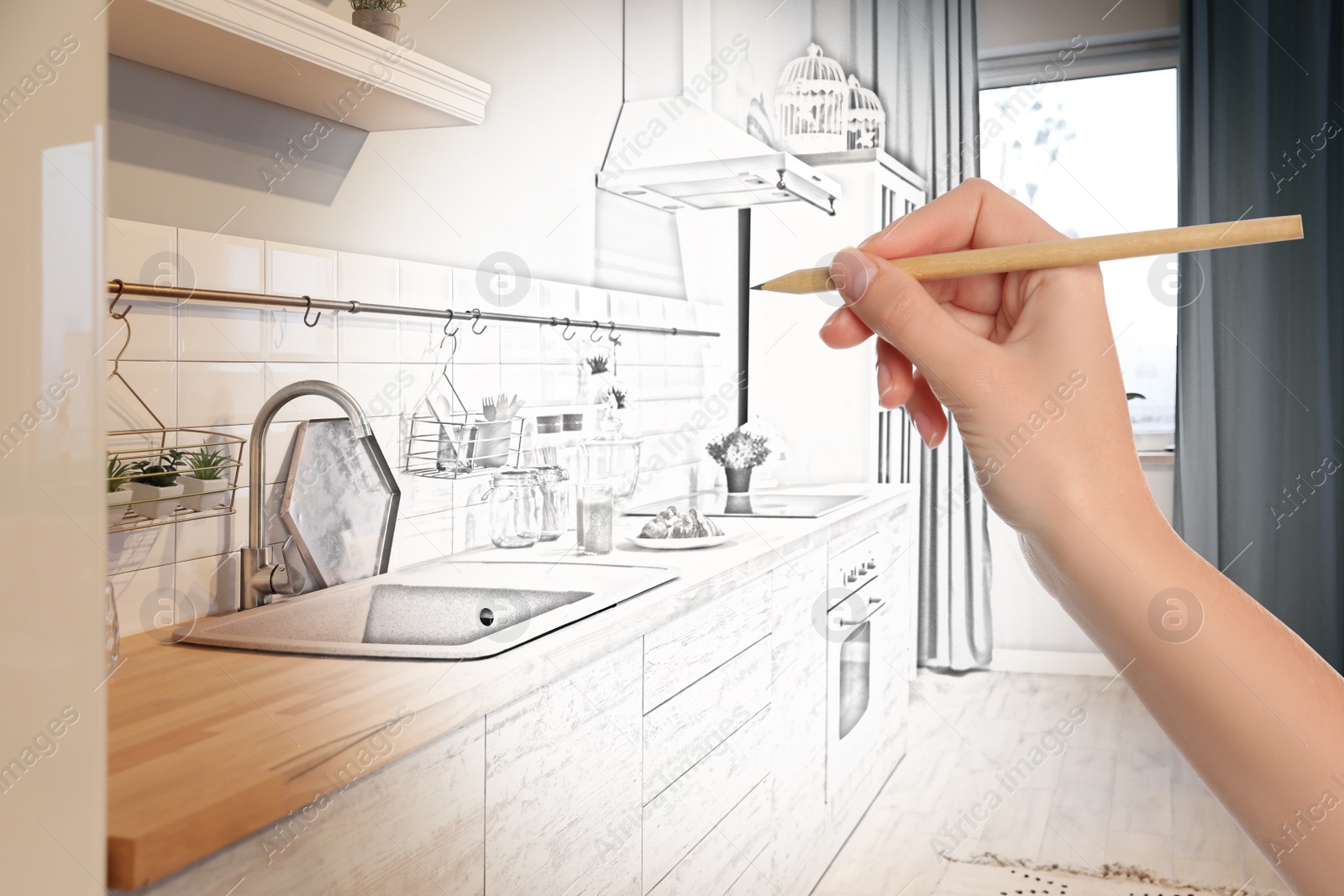 Image of Woman drawing kitchen interior design. Combination of photo and sketch