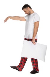 Photo of Man with pillow in sleepwalking state on white background