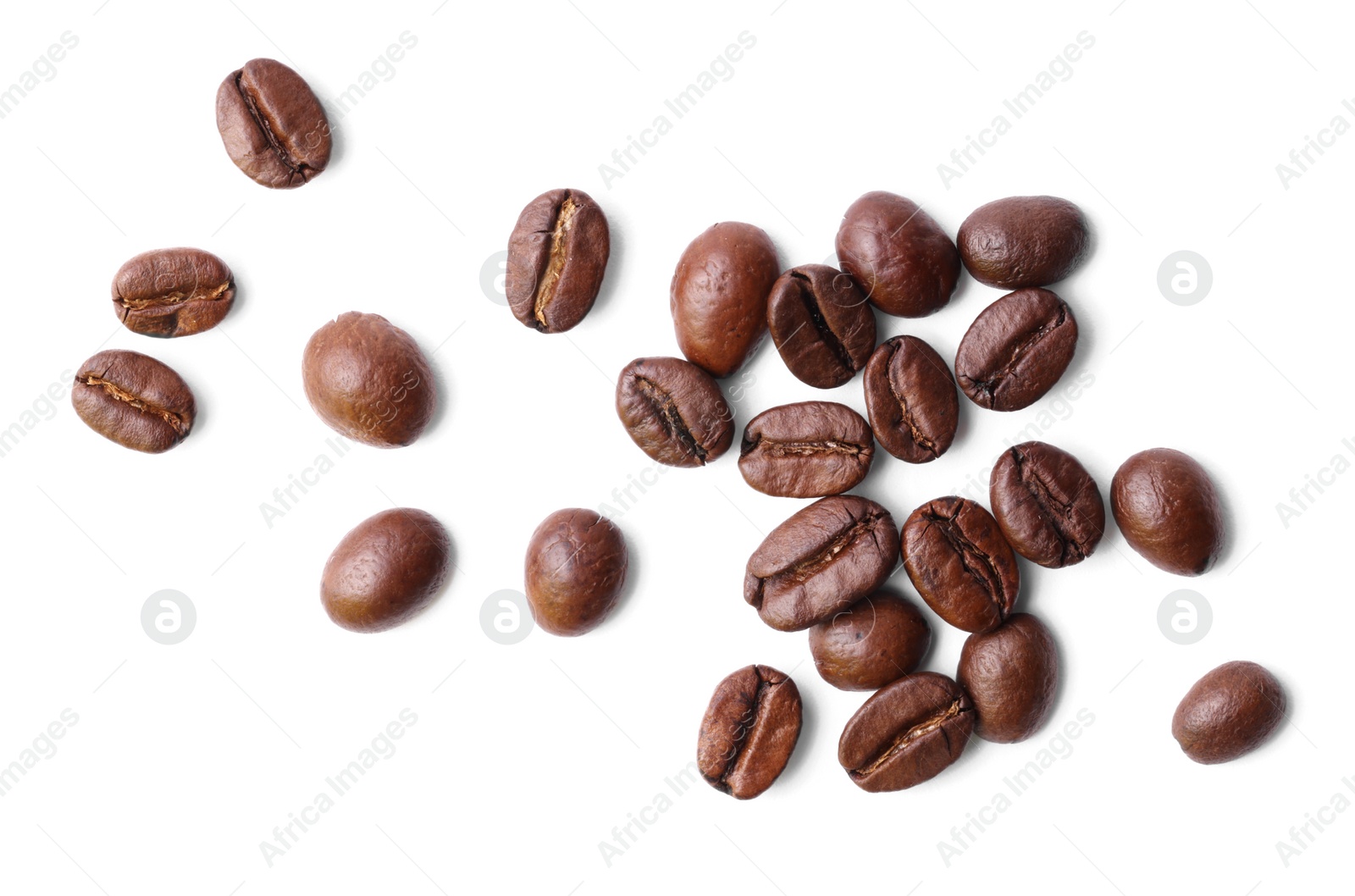 Photo of Many roasted coffee beans isolated on white, top view