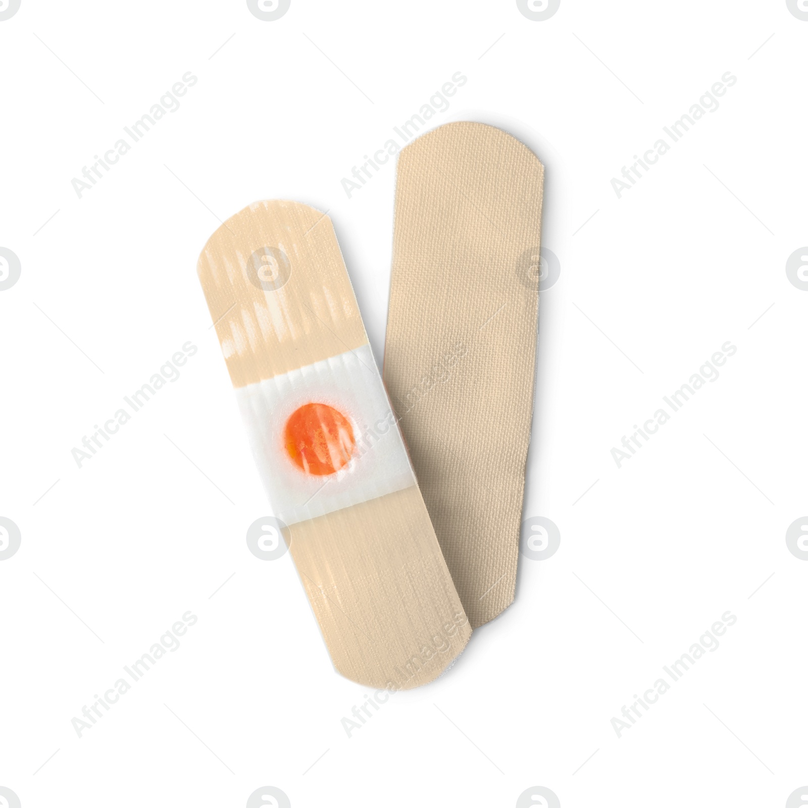 Medical sticking plasters isolated on white. First aid item Photo of Medical sticking plasters isolated on white. First aid item