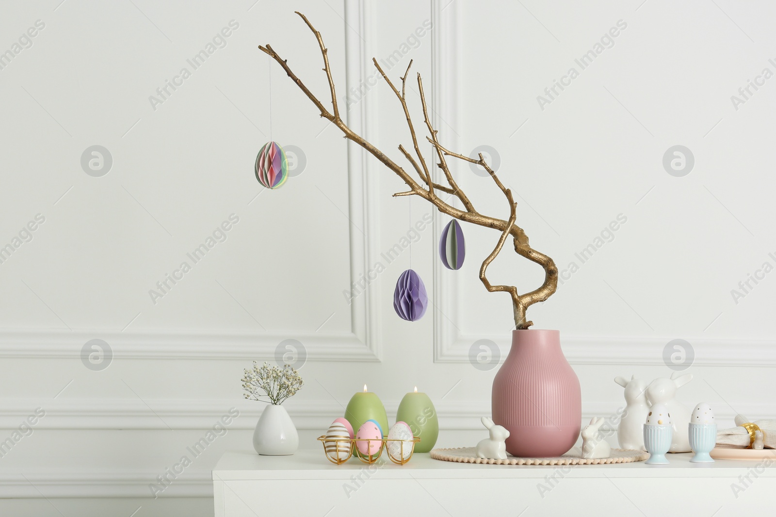 Photo of Beautiful festive composition with Easter decor on white table indoors