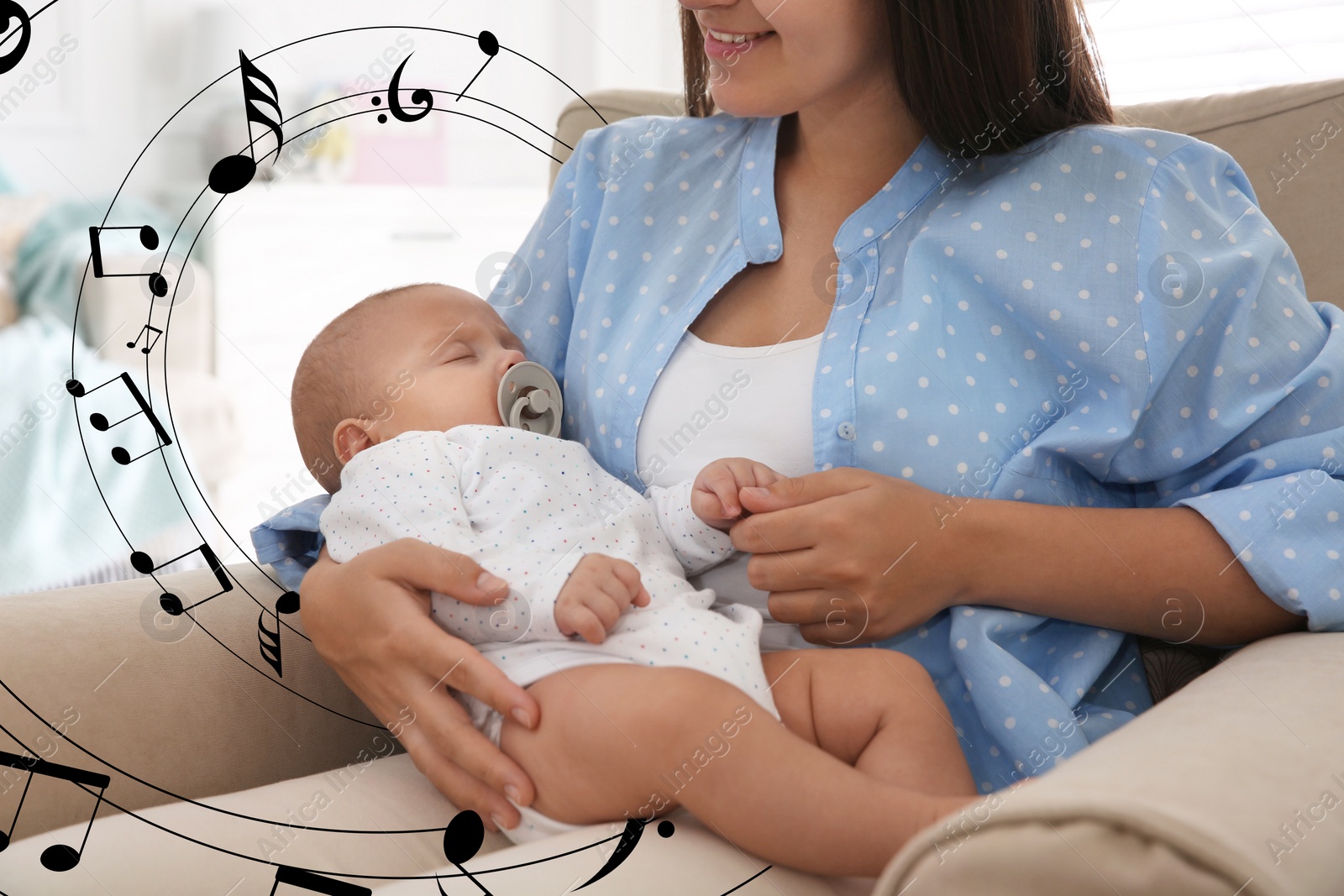 Image of Mother singing lullaby to her baby at home. Illustration of flying music notes around woman and child